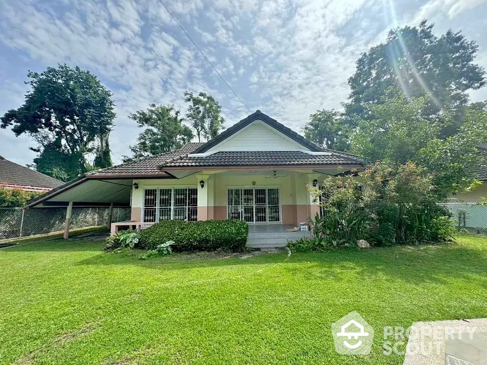 Charming single-story house with lush garden and spacious front yard