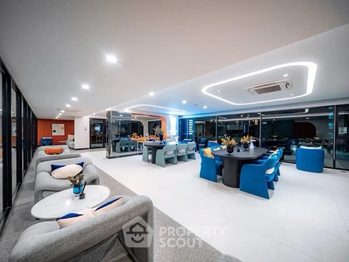 Luxurious modern living room with elegant seating and ambient lighting