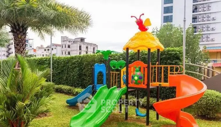 Vibrant playground in lush garden setting, perfect for family-friendly living.