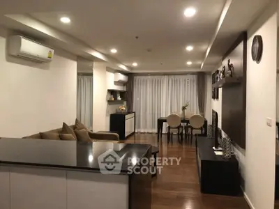 Spacious modern living room with elegant dining area and stylish decor