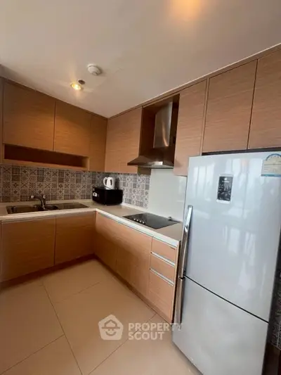 Modern kitchen with sleek cabinetry and stainless steel appliances