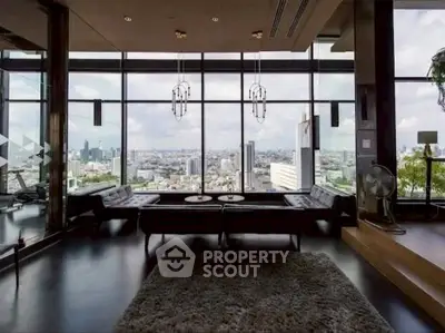 Luxurious living room with panoramic city view and modern decor