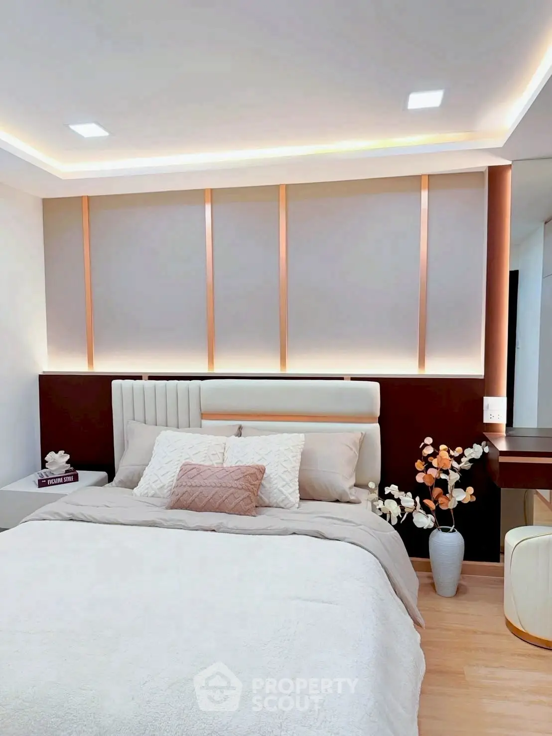 Modern bedroom with elegant lighting and stylish decor