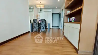 Spacious modern living area with elegant dining set and stylish decor