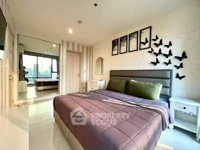 Modern bedroom with stylish decor and city view, featuring a cozy bed and mirrored wardrobe.