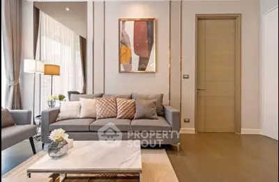 Modern living room with stylish decor and cozy seating area, perfect for relaxation and entertaining.