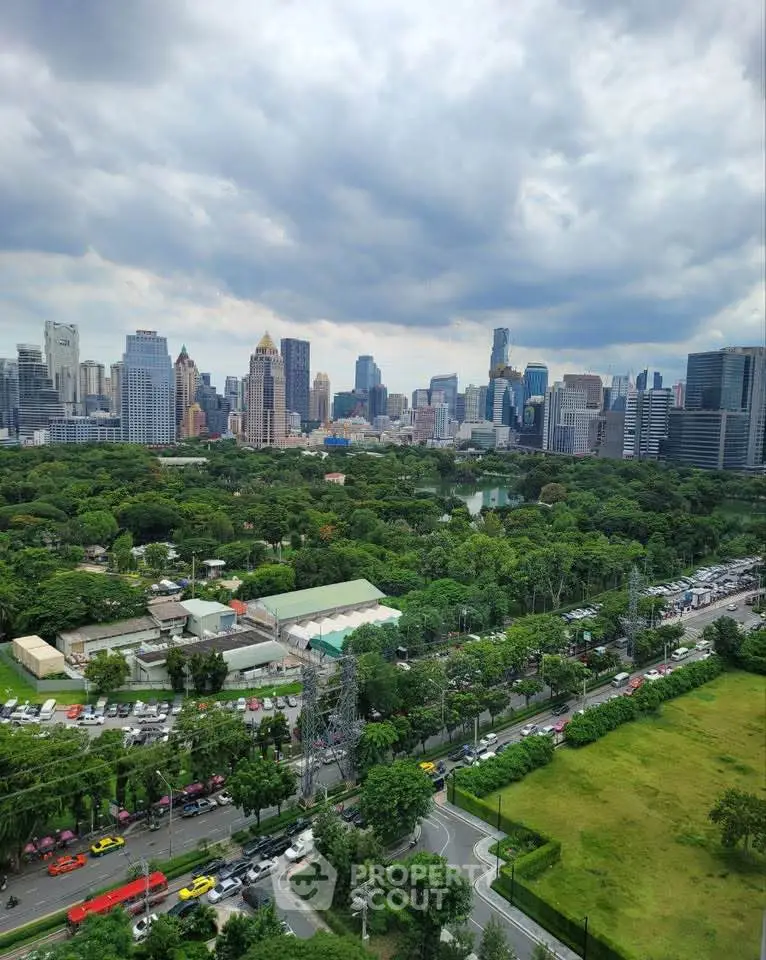 Stunning cityscape view with lush greenery and skyline, perfect for urban living enthusiasts.