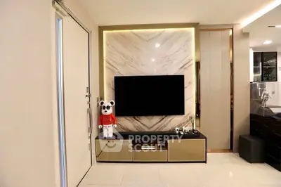 Modern living room with sleek TV setup and stylish decor