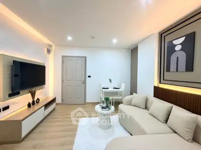 Modern living room with stylish decor and cozy seating area, perfect for relaxation and entertainment.