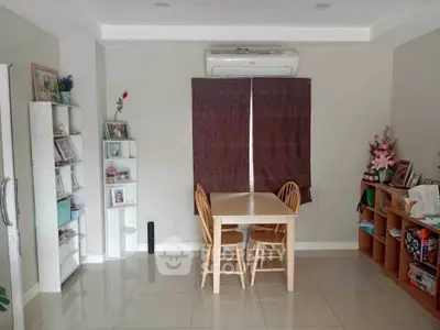 Cozy dining area with modern decor and air conditioning