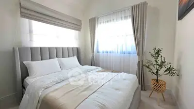 Cozy bedroom with elegant decor and natural light