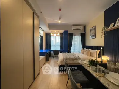 Modern studio apartment with stylish decor and natural light