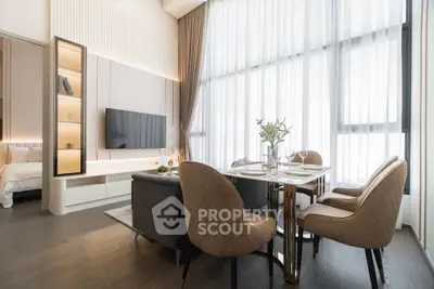 Luxurious modern living room with high ceilings and elegant dining area