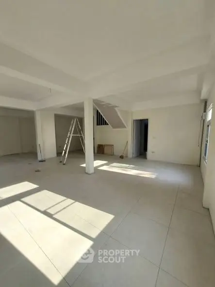 Spacious open-plan interior with abundant natural light and modern design.