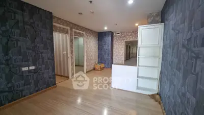 Spacious interior with modern wallpaper and wooden flooring, ideal for customization.