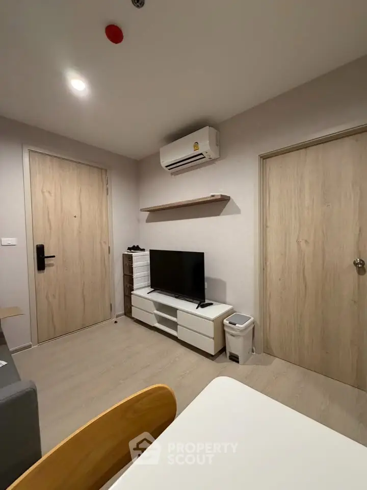 Modern living room with air conditioning and minimalist decor