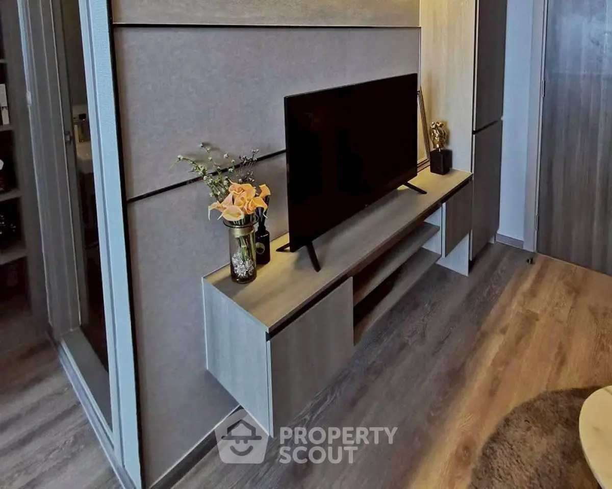 Modern living room with sleek TV stand and stylish decor