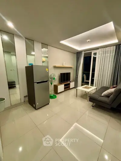 Modern living room with sleek design and balcony access