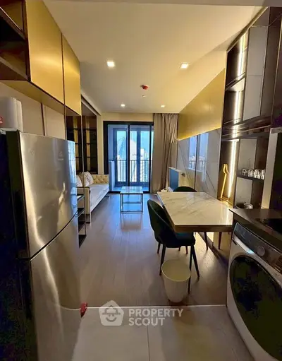 Modern apartment kitchen with open layout and city view, featuring sleek appliances and stylish dining area.