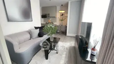 Modern living room with sleek furniture and natural light