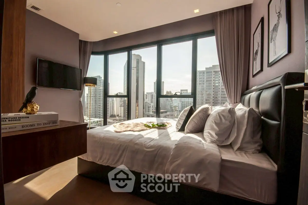 Luxurious bedroom with stunning city view and modern decor