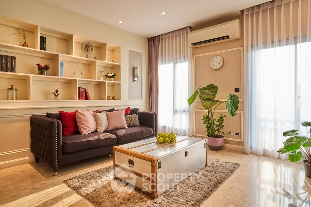 Elegant living room with stylish decor and natural light