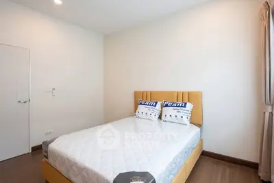 Modern bedroom with cozy bed and minimalist design