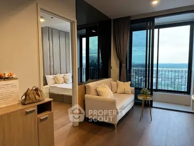 Modern apartment with stunning city view and cozy living area