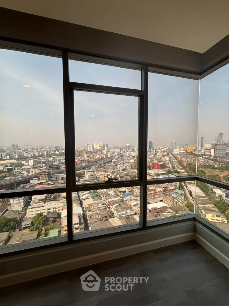 Stunning high-rise city view from modern apartment window