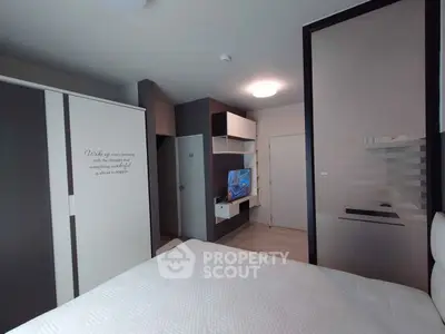 Modern bedroom with sleek design and built-in storage solutions