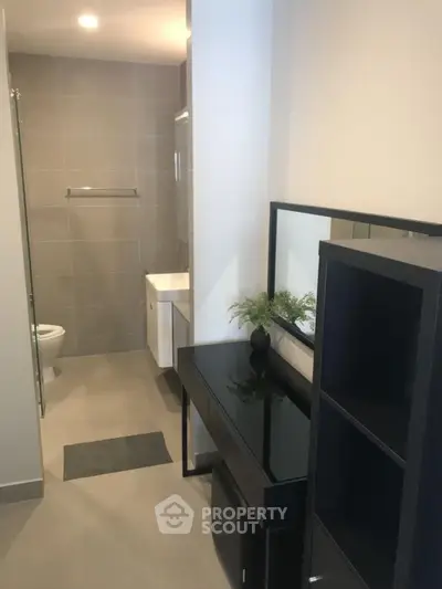 Modern bathroom with sleek design and stylish black furniture