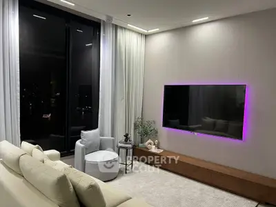Modern living room with stylish furniture and ambient lighting