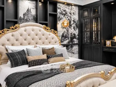 Luxurious bedroom with elegant decor and plush bedding in a sophisticated setting.