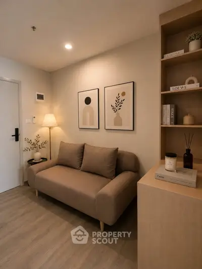 Cozy modern living room with stylish decor and comfortable sofa, perfect for relaxation.