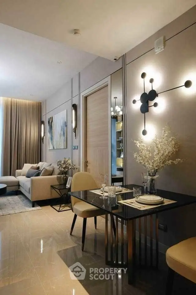 Elegant modern living room with stylish dining area and contemporary lighting.