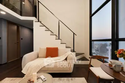Modern duplex living room with city view and stylish staircase