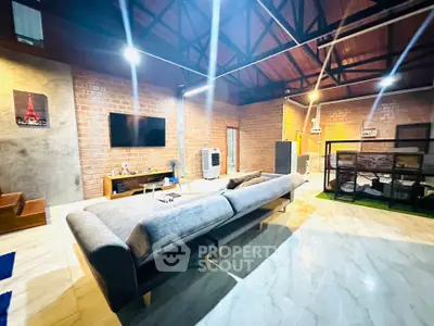 Spacious modern living room with high ceilings and stylish decor