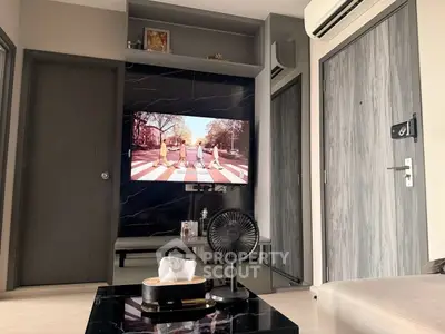 Modern living room with sleek TV setup and stylish decor