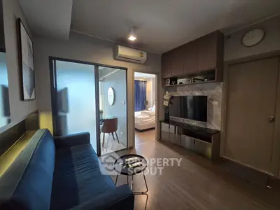 Modern living room with sleek design and cozy ambiance