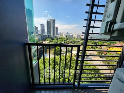 Stunning city view from modern balcony with sleek railing design
