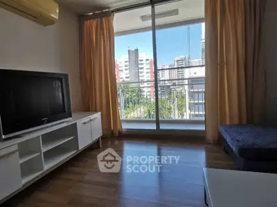 Modern living room with balcony view in urban apartment