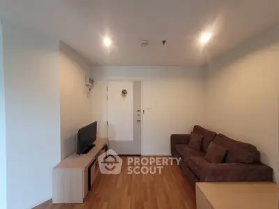 Cozy living room with modern furniture and wooden flooring