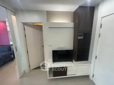 Modern living room with sleek TV unit and stylish decor