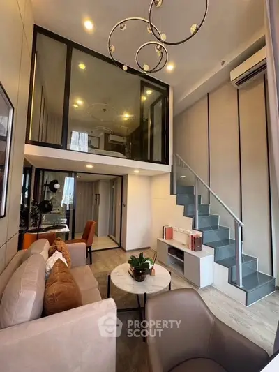 Modern loft-style living room with high ceilings and elegant decor