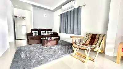 Bright and cozy living room with modern furniture and air conditioning