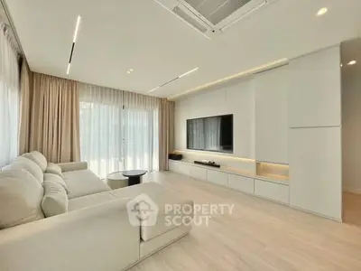 Elegant modern living room with sleek design and natural light