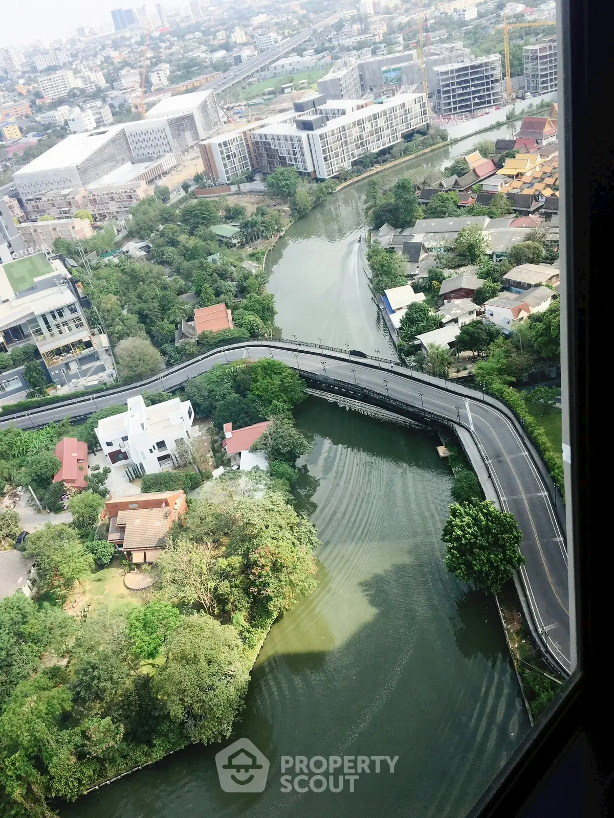 Stunning aerial view of urban landscape with river and modern buildings