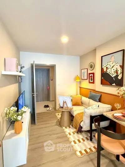 Charming modern living room with stylish decor and cozy seating area.