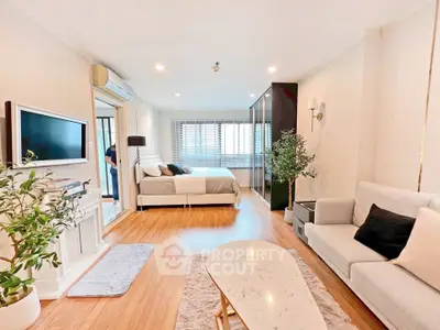 Spacious modern studio apartment with elegant decor and natural light