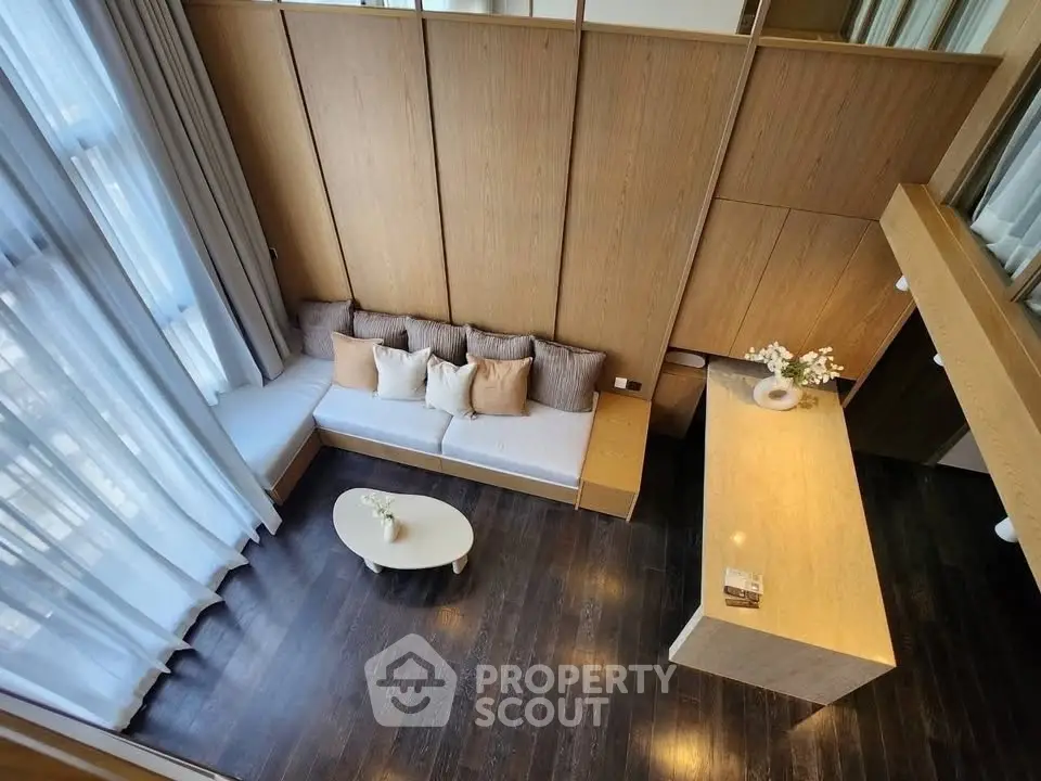 Luxurious modern living room with high ceilings and elegant decor